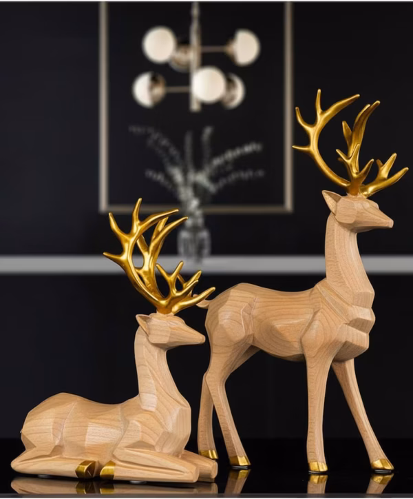 2 Hand-Carved Deer