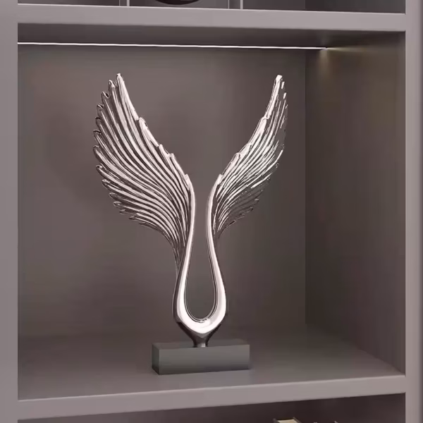 Elegant silver resin angel wings sculpture