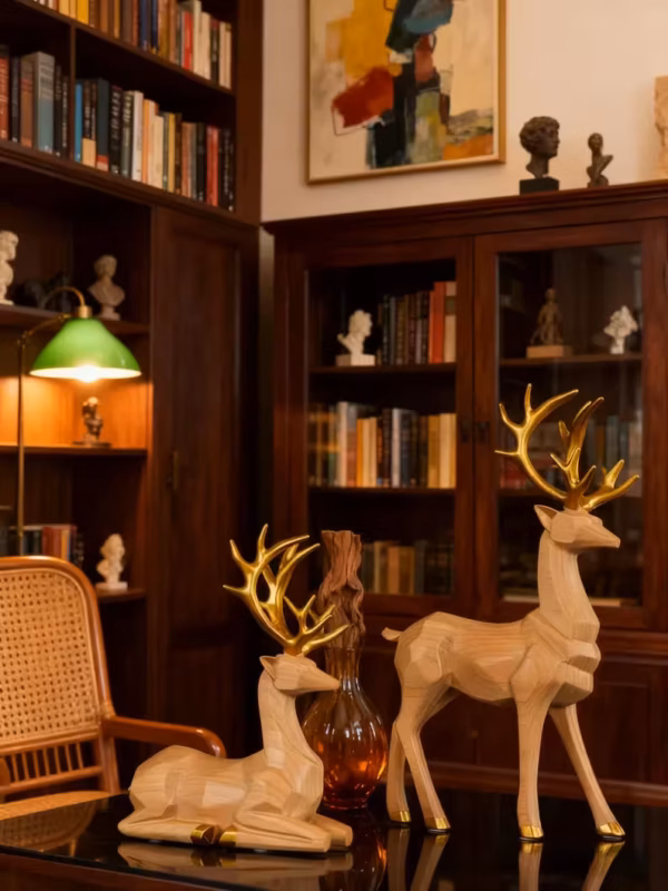 2 Hand-Carved Deer