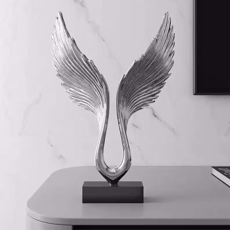 Elegant silver resin angel wings sculpture
